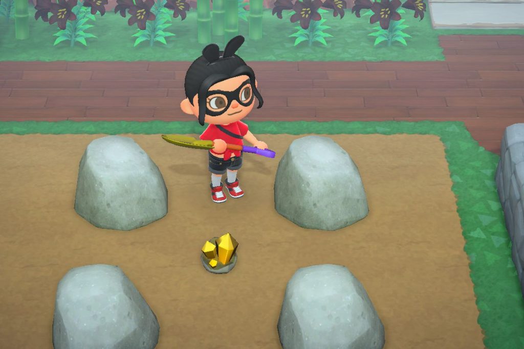 Une pépite d'or obtenue en frappant une pierre dans Animal Crossing New Horizons