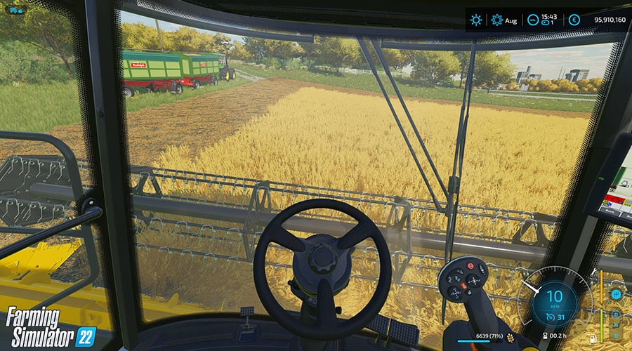 Conduisez une moissonneuse batteuse dans Farming Simulator